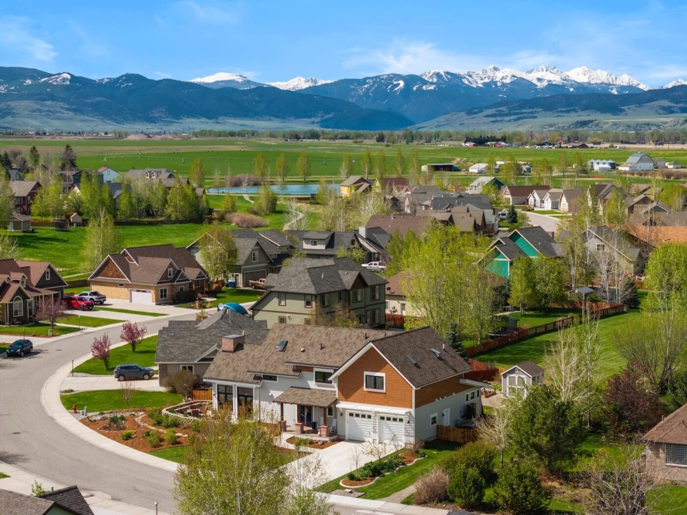 Aerial photography of mountains behind neighborhood